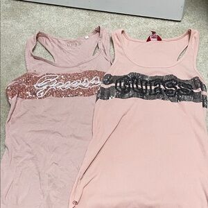 2 Guess Pink Sequin Logo Tank Top - Light Pink and the other is Black sequins